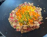 A picture of step 4 of Chicken & Hotdog Fried Rice Recipe.