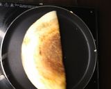 A picture of step 3 of Schezwan paneer masala dosa.