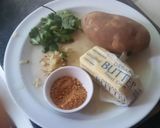 A picture of step 2 of A novel recipe- ravioli/samosa  made with rice paper stuffed with veggies.