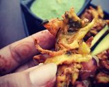 A picture of step 1 of Raw mango pakodas.