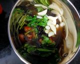 A picture of step 2 of Takali (Tomato) Rasam.