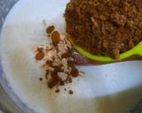 A picture of step 8 of Nolen gurer payesh or Rice kheer with date palm jaggery.