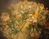 A picture of step 3 of Salmon with courgettes spinach and orange bell pepper.
