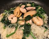 A picture of step 4 of Super Healthy Cellophane noodles with shrimps mussels pork fried vegetables.