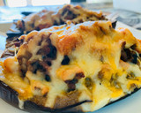 Foto del paso 5 de la receta: Berenjena rellena de carne y verduritas🥕🍗🍆🧅