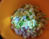 A picture of step 2 of Raw mango, onion bhaji.