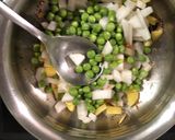 A picture of step 2 of Mooli-Aloo-Matar.