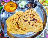 तिकोना बेसन परांठा और आलू टमाटर की चटपटी सब्जी रेसिपी चरण 9 फोटो