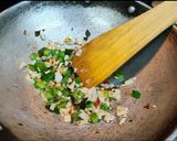 A picture of step 1 of Tempered chilli upma.