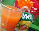 A picture of step 7 of Tropical Cocktail Carrot Tang Drink.