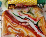 A picture of step 13 of Parle-G Biscuits Brownie with Mirror Glaze Effect.