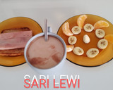 Foto del paso 4 de la receta: Desayuno caliente día 3>Leche con ColaCao>Tostada de jamón cocido>Mandarina y plátano