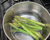 A picture of step 1 of Asparagus in wild garlic and lemon butter.