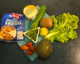 A picture of step 1 of Exotic harvest summer fruit salad.