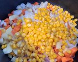 Une image de l'étape 1 de Cassolette de maïs au cheddar.