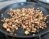 A picture of step 2 of Chicken breast stuffed with mushrooms poured mushroom sauce.