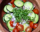 A picture of step 2 of Cucumber and Cherry Tomato Salad.