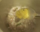 A picture of step 2 of Tomato Rice.