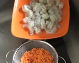 A picture of step 1 of Dal Chingri/Red Lentils with Shrimps.