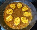 A picture of step 9 of Egg tawa masala.