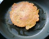 A picture of step 4 of Besan chilla.