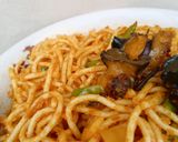 A picture of step 6 of Fried Baby Snails On Mixed Veggies Jollof Pasta.