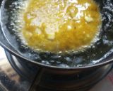 A picture of step 4 of Til masala poori.