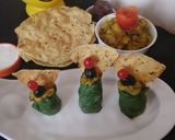 A picture of step 6 of Khichadi palak roll.