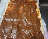 Foto del paso 6 de la receta: Pionono dulce con dulce de leche y chocolates confitados
