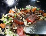 A picture of step 3 of Chicken and veg fried...