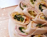 A picture of step 4 of Mini Ham and Cream Cheese Wraps.
