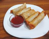 A picture of step 6 of Chicken vegetable spring rolls.