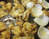 A picture of step 2 of Gribenes /Fried Onions and Crispy Chicken Skins.
