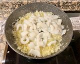 Foto del paso 3 de la receta: “ Arroz meloso” con anillas de pota