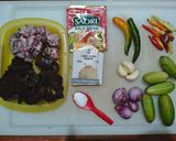 Foto langkah ke 1 dari resep Tumis Cumi Belimbing Wuluh.