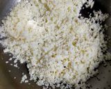 A picture of step 1 of Coconut Laddu.