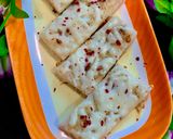 A picture of step 3 of Garlic cheese bread.