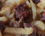 Foto del passaggio 4 della ricetta Patate gratinate al forno con salsiccia calabrese dolce