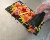 A picture of step 10 of Rose Sushi Roll.