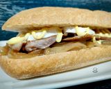 Foto del paso 4 de la receta: Bocadillo de solomillo y queso de cabra con cebolla caramelizada y salsa miel-mostaza