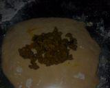 A picture of step 5 of Bow tie buns.