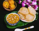 A picture of step 10 of Mango Kheer and Puri.