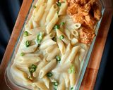 A picture of step 5 of Volcanic chicken with white sauce pasta.