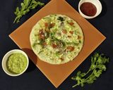 A picture of step 3 of Veg suji uttapam.