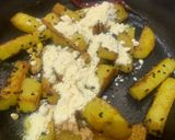 A picture of step 3 of Onion stalk stir fried with Potato.
