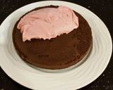 A picture of step 14 of Dark Chocolate Layer Cake with Fresh Strawberry Cream Frosting and Filling.