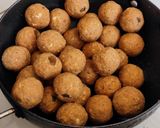 A picture of step 6 of Gond besan makana ladu.