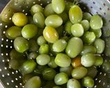 A picture of step 1 of Green tomato pickle (Lila tomatanu athanu).