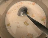 A picture of step 1 of Raisin Oats With coco powder and Honey.