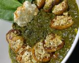 A picture of step 10 of Stuffed Italian spiced potato in spinach.